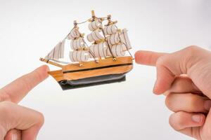 Model Sailboat in hand photo