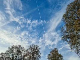 Stunning cirrus cloud formation panorama in a deep blue sky photo