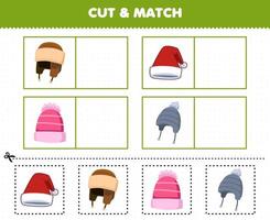 juego educativo para niños: corte y combine la misma imagen de la linda caricatura de gorro de lana hoja de trabajo de invierno imprimible vector