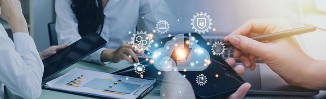 man use Laptop with cloud computing diagram show on hand. Cloud technology. Data storage. Networking and internet service concept. photo