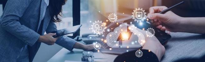 man use Laptop with cloud computing diagram show on hand. Cloud technology. Data storage. Networking and internet service concept. photo