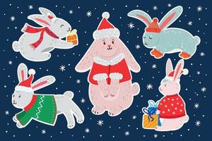 Pack of Christmas stickers with cute rabbits in Christmas clothes. Set of cut and print Chritmas rabbits stickers. Year of the rabbit vector