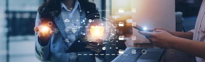 Document management system concept, Businessman signs electronic documents on digital documents, searching and managing files online document database, for efficient archiving and company data photo