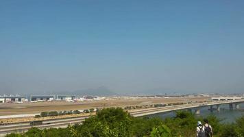 HONG KONG NOVEMBER 09, 2019 - TAirplane traffic at Hong Kong airport. Timelapse airport terminal overlooking the runway video