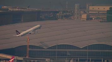 HONG KONG NOVEMBER 9, 2019 - Aerial view Chek Lap Kok International Airport, Hong Kong, Airbus A321 Cathay Dragon climb. video