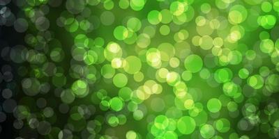 Dark Green, Yellow vector background with spots.