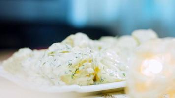 Such a tender potato salad with mastard, mayonnaise, red onion and dill. Wath the recipe in video