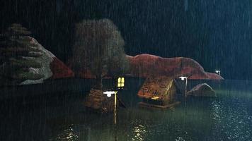 la pluie nocturne tombe sur le petit village et les bungalows au toit de chaume au milieu de la vallée désolée video