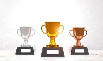 Trophies for winners. Set of gold, silver, and bronze trophies on white background. Winner concept, award design, achievement, 1st, 2nd, 3rd place. 3D rendering illustration photo