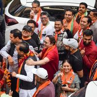 New Delhi, India, November 20 2022 - Bharatiya Janata Party BJP supporters during a rally in support of BJP candidate Pankaj Luthara to file nomination papers ahead of MCD local body Elections 2022 photo