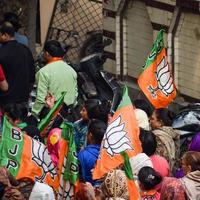 New Delhi, India, November 20 2022 - Bharatiya Janata Party BJP supporters during a rally in support of BJP candidate Pankaj Luthara to file nomination papers ahead of MCD local body Elections 2022 photo