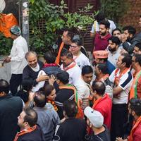 New Delhi, India, November 20 2022 - Bharatiya Janata Party BJP supporters during a rally in support of BJP candidate Pankaj Luthra to file nomination papers ahead of MCD local body Elections 2022 photo