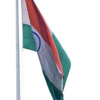 India flag flying high at Connaught Place with pride in blue sky, India flag fluttering, Indian Flag on Independence Day and Republic Day of India, tilt up shot, Waving Indian flag, Har Ghar Tiranga photo