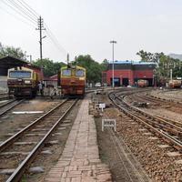 Kalka, Haryana, India May 14 2022 - Indian toy train diesel locomotive engine at Kalka railway station during the day time, Kalka Shimla toy train diesel locomotive engine photo