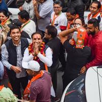 New Delhi, India, November 20 2022 - Bharatiya Janata Party BJP supporters during a rally in support of BJP candidate Pankaj Luthra to file nomination papers ahead of MCD local body Elections 2022 photo
