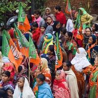 New Delhi, India, November 20 2022 - Bharatiya Janata Party BJP supporters during a rally in support of BJP candidate Pankaj Luthra to file nomination papers ahead of MCD local body Elections 2022 photo