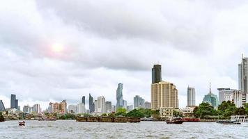 Bangkok cityscape and Chao Phraya River with cloudscape photo