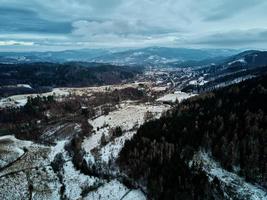 Landscape with winding road through mountain, aerial view photo