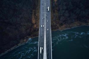 Aerial view of highway bridge with moving cars photo