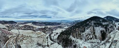 Landscape with winding road through mountain, aerial view photo