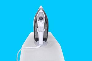 electric iron on ironing board Housework and housekeeping photo
