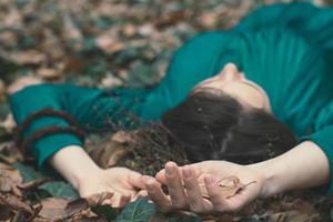 Close up lady lying on ground concept photo