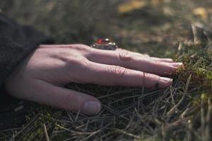 Close up woman hand with retro ring concept photo