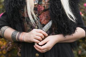 Close up lady handling knife concept photo