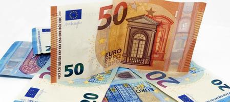 Euro banknotes.Pile of paper euro banknotes.Euro European currency - money.Euro cash background. photo
