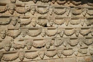 Ancient Mask Reliefs in Aphrodisias Ancient City in Aydin, Turkiye photo