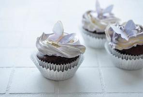 Cupcakes with butterfly decorations photo