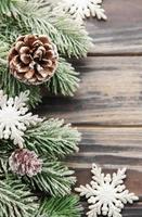 Christmas background with fir tree and decor. Top view with copy space photo