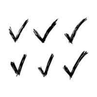 Set of six hand drawn check symbols. Black sketch check symbol on white background. Vector illustration