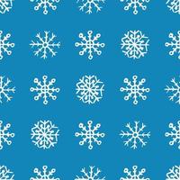 Seamless background of hand drawn snowflakes. White snowflakes on blue background. Christmas and New Year decoration elements. Vector illustration.