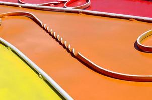 Metal texture of a piece of colored wall with a forged pattern photo