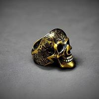 beautiful men skull ring in yellow and white gold photo