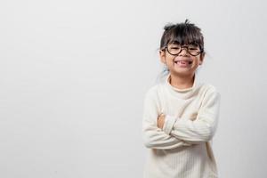 Asian little girl thinking something select focus shallow depth of field with copy space photo