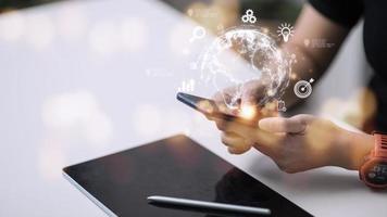 People use mobile smartphones. Business global internet connection application technology and digital marketing, Financial and banking, Digital link tech, big data. photo