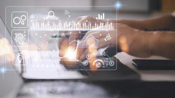 Data scientists. Man programmer using laptop analyzing and development at various information on futuristic virtual interface screen. Algorithm. marketing and deep learning of artificial intelligence photo