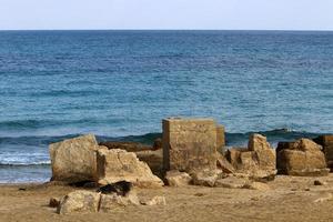 Stones on the shore of the Mediterranean Sea. photo