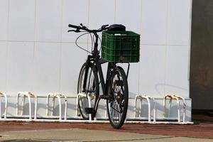 Bicycle in the city park near the sea. photo