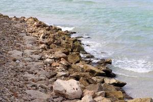 Stones on the shore of the Mediterranean Sea. photo