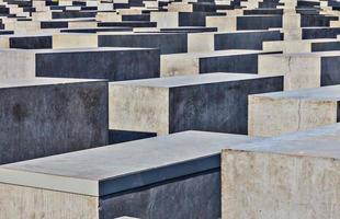 View on concrete blocks of Holocaust memorial in Berlin in summer photo