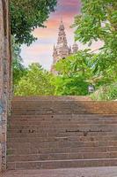 View of the main dome of the Palau Nacional in Barcelona from a park with stone stairs photo