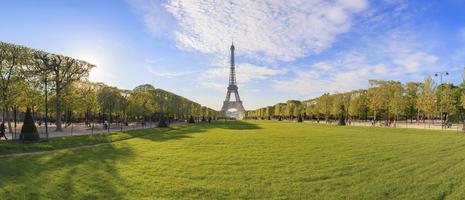 Panorama of the Champ de Mars park in Paris with Eiffel Tower photo