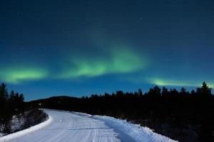 Northern lights, aurora borealis, in lapland Finland photo