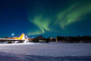 Northern lights, aurora borealis, in lapland Finland photo