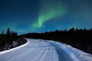 Northern lights, aurora borealis, in lapland Finland photo