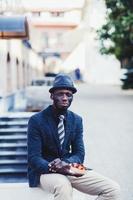 black man eating fast food photo