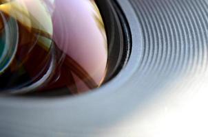 Photo Camera lens close up macro view. Concept of photographer or camera man job